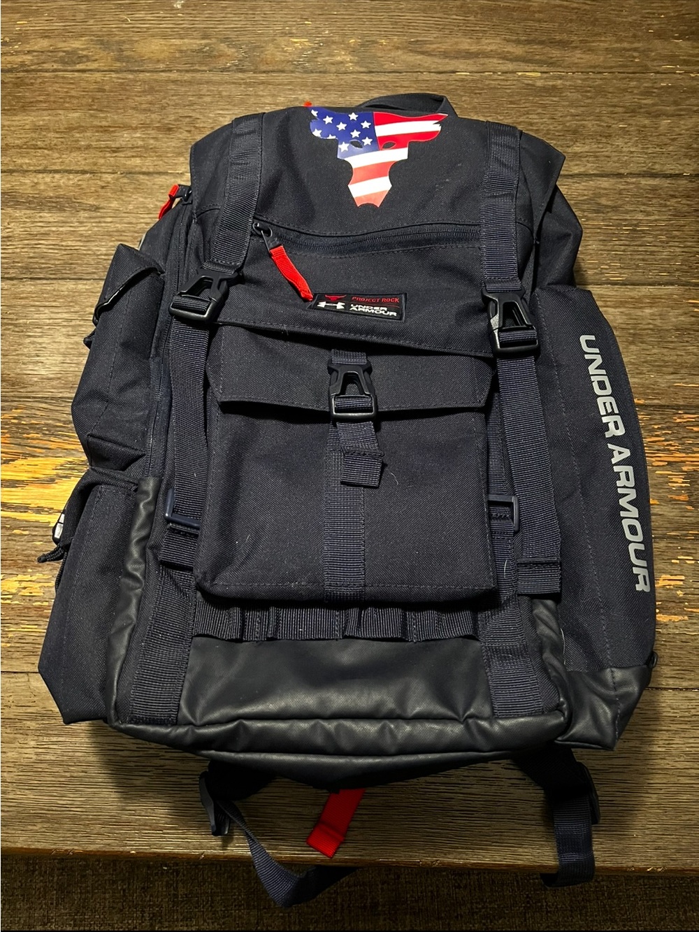 Under Armour Navy Backpack with Gray Interior and Red Zipper Accents